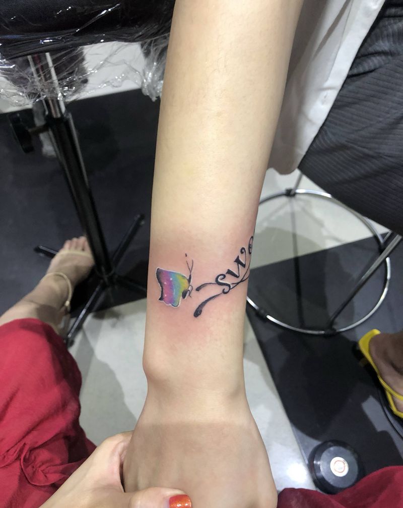 蝶VS英文纹身图片_手臂纹身图案