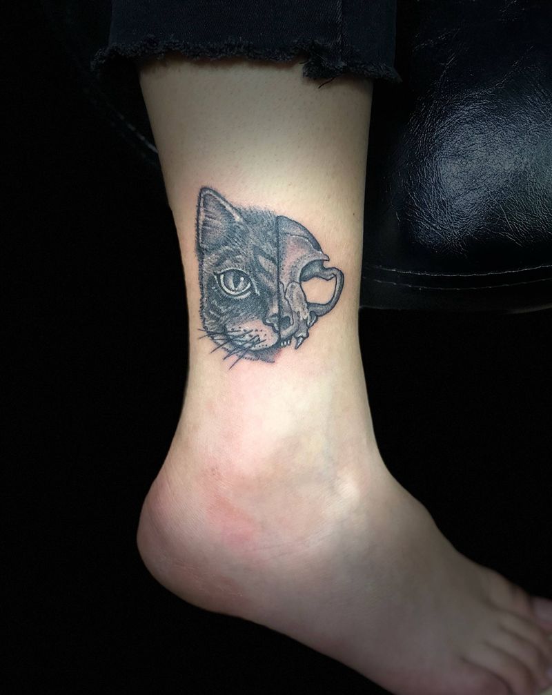 猫咪头颅纹身图片