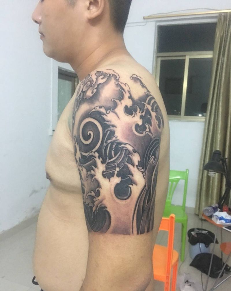 浪花大臂纹身图片