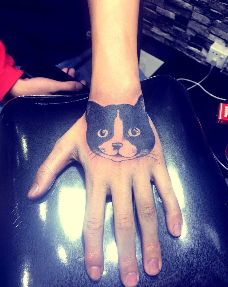 猫咪手面纹身图片
