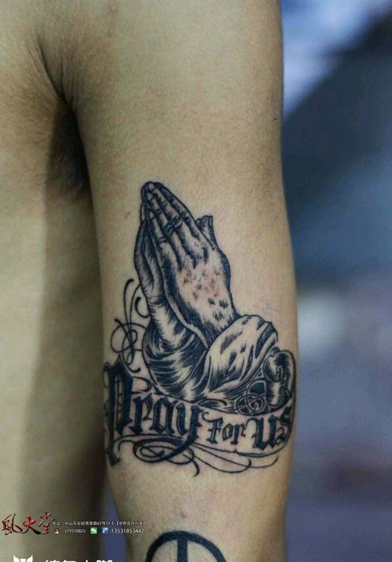 祈祷之手纹身纹身图片_手臂欧美宗教成品纹身图案