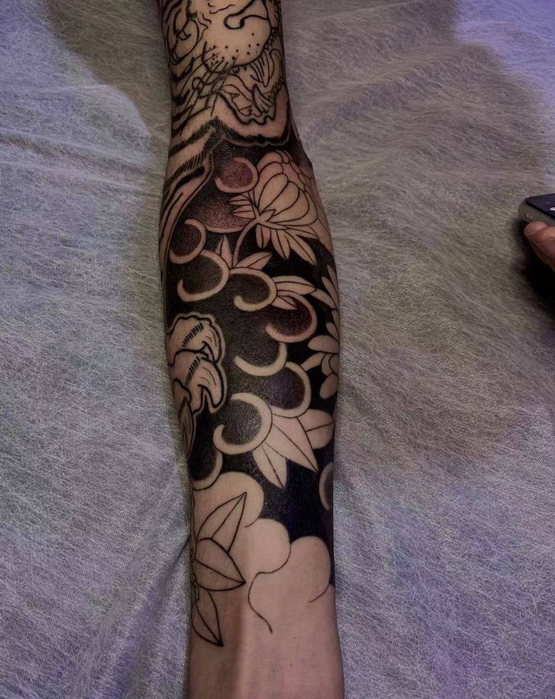 未完纹身图片_手臂老传统纹身图案