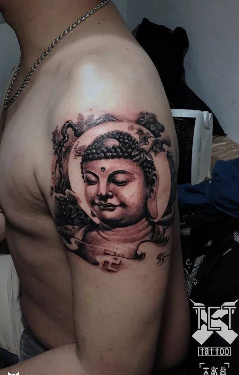 大臂佛纹身图片