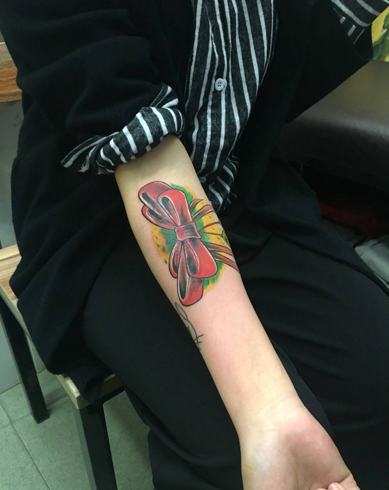 蝴蝶结遮盖旧图一枚纹身图片_成品手臂清新静物原创纹身图案