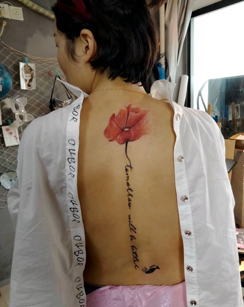 花纹身图片_背部水彩纹身图案