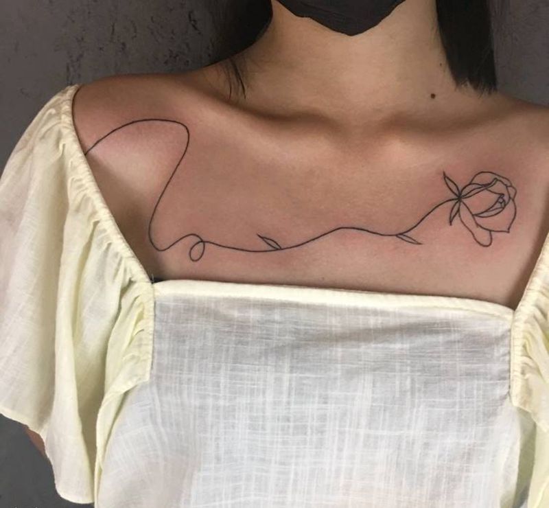 一线花纹身图片_胸部几何纹身图案