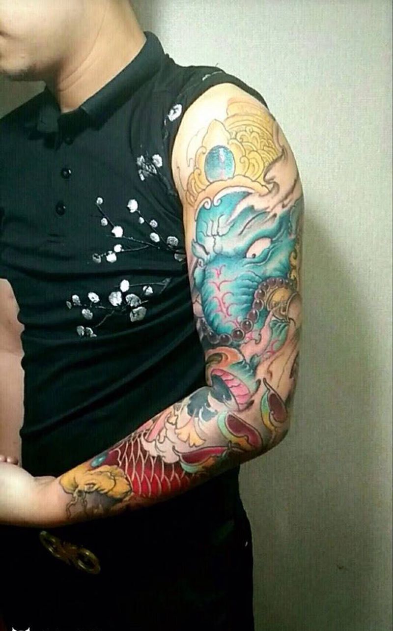 全彩花臂未完成纹身图片_手臂新传统纹身图案