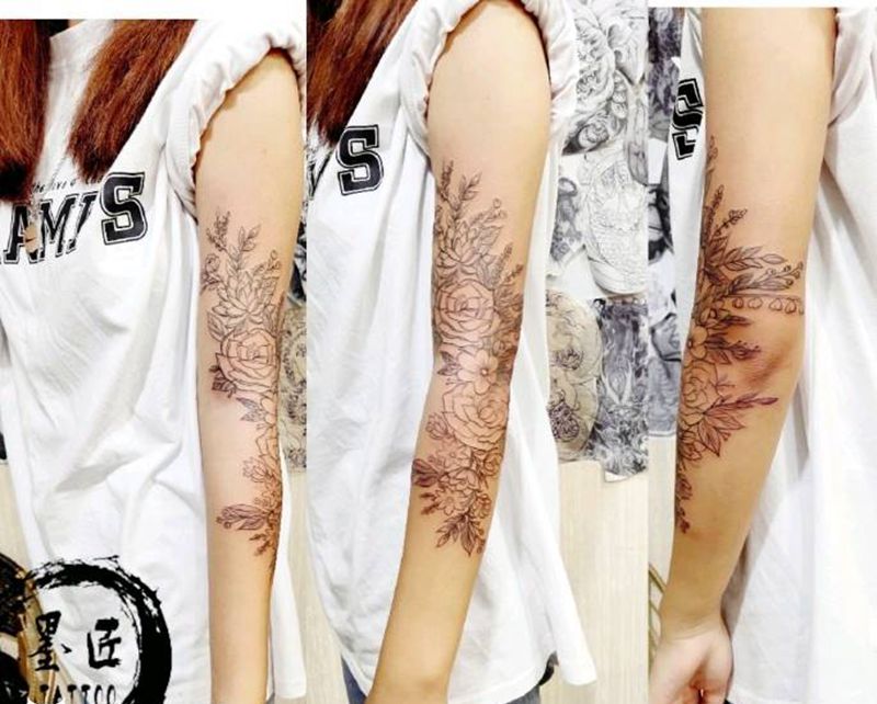 素花纹身图片_手臂手部点刺纹身图案