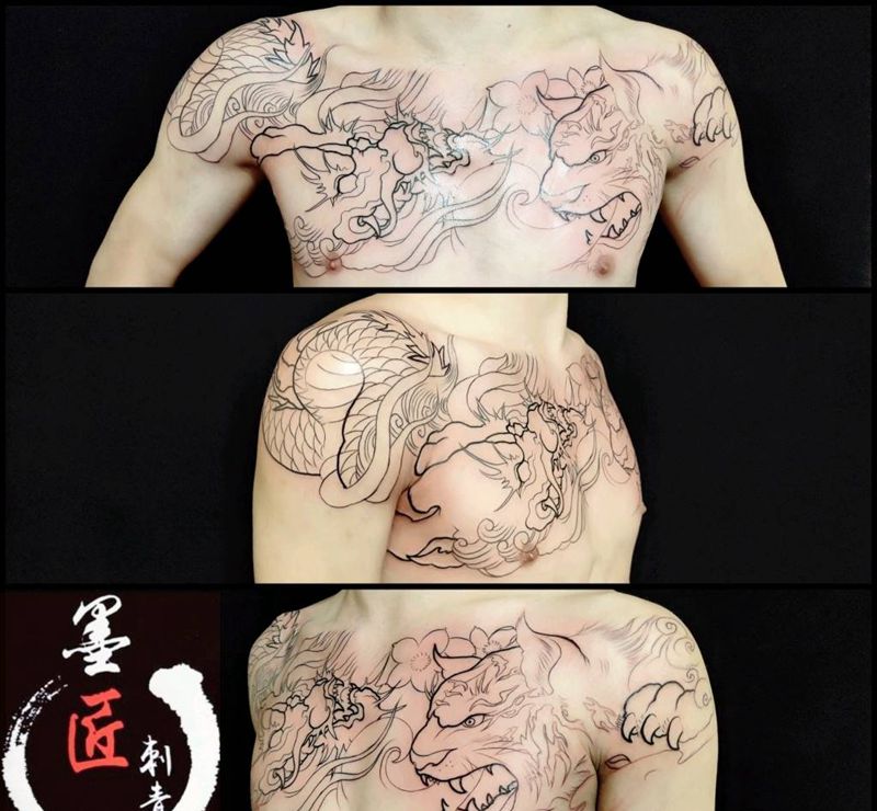 花胸龙争虎斗未完待续纹身图片_胸部新传统纹身图案