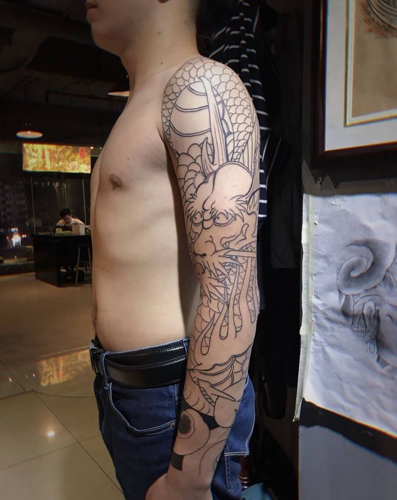 又龙纹身图片_手臂老传统纹身图案