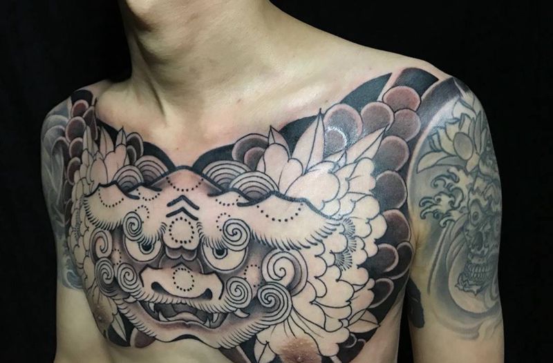 花胸唐狮纹身图片_胸部新传统老传统纹身图案