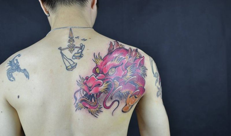 new school 龙纹身图片