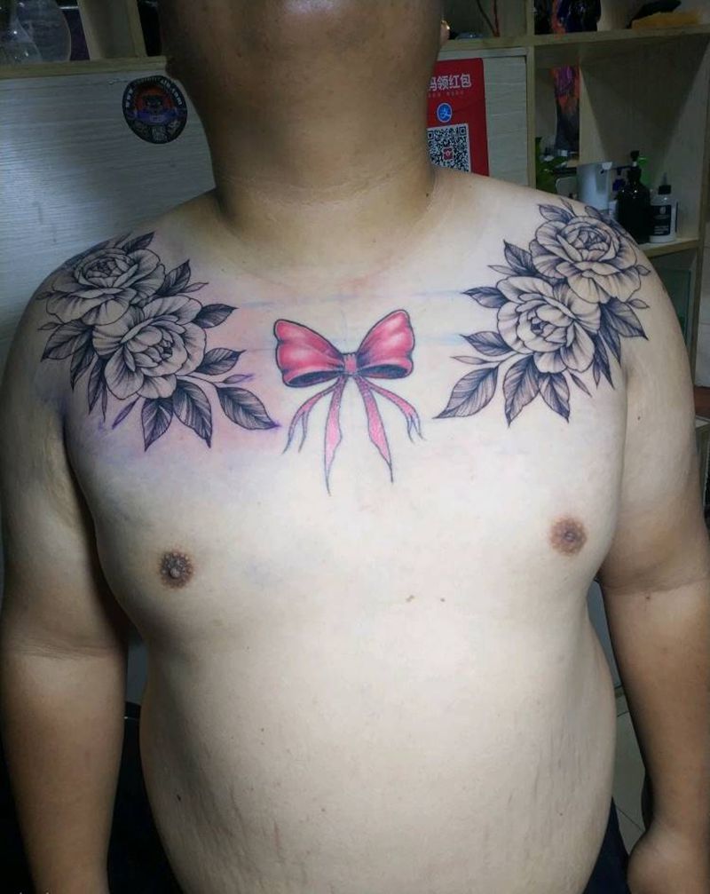 素花  蝴蝶结纹身图片_胸部纹身图案