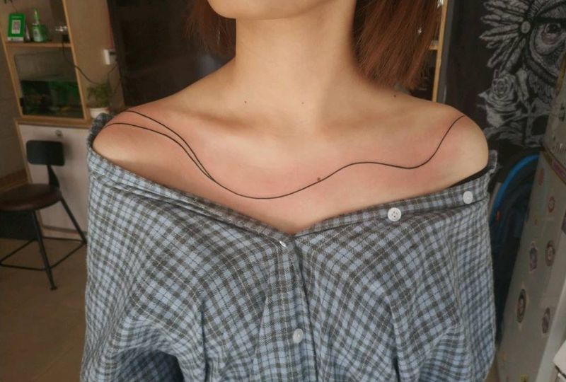 一条线纹身图片_颈部纹身图案