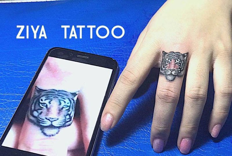 小老虎一枚纹身图片