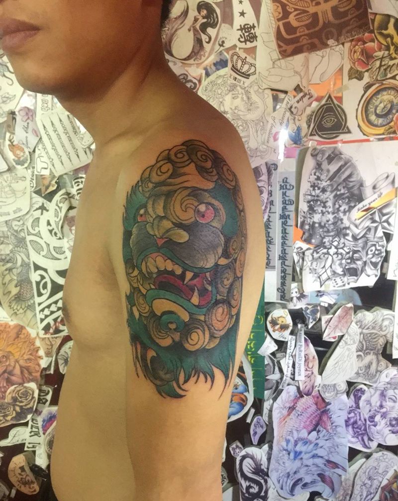 唐狮盖图纹身图片