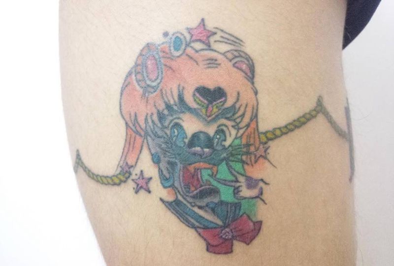 顾客帮忙拍摄，卡通梦纹身图片