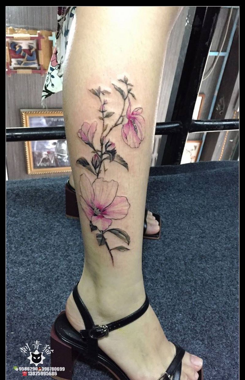 茶花纹身图片_成品腿部脚部清新欧美植物纹身图案