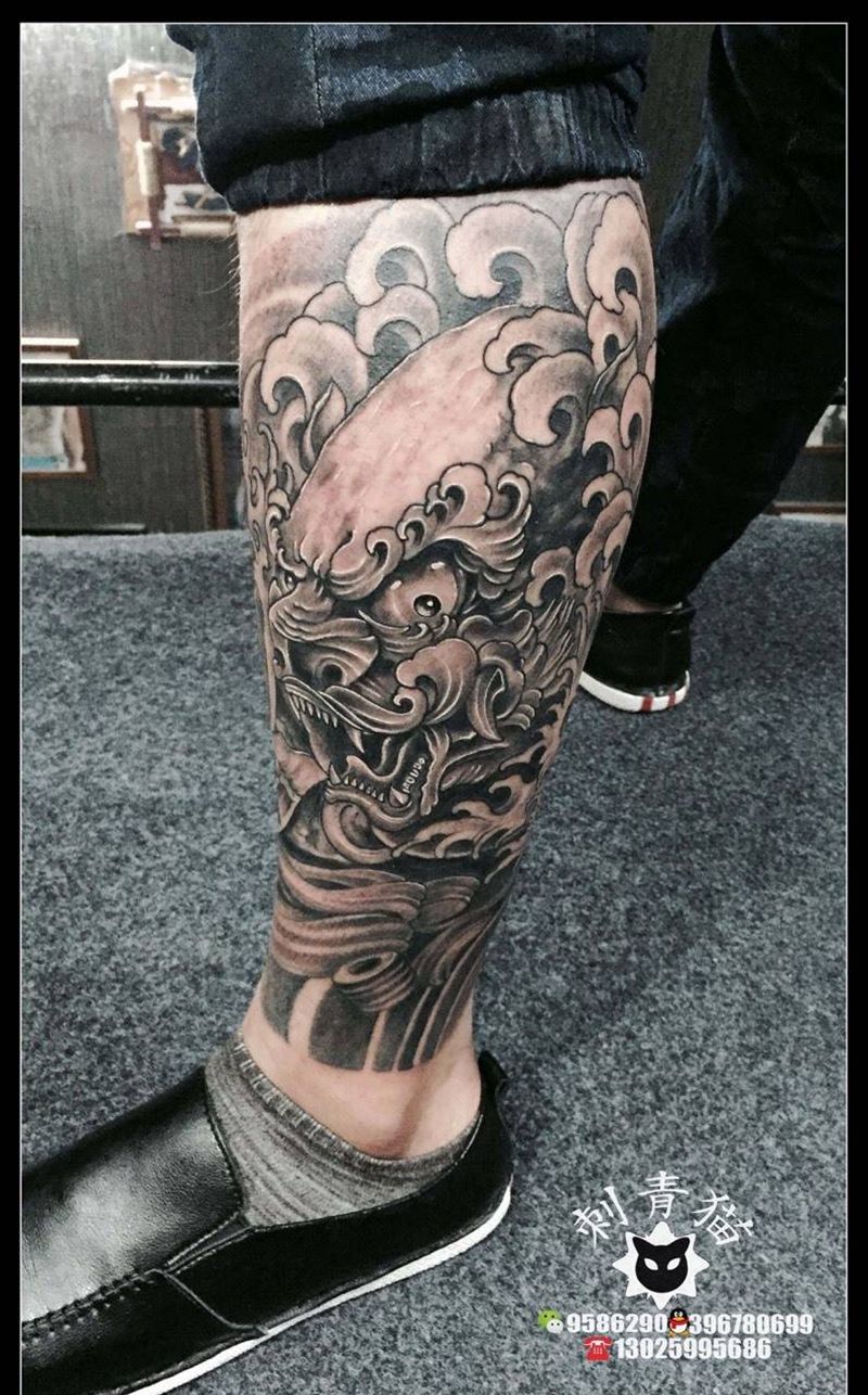 唐狮子纹身图片_成品脚部腿部传统动物纹身图案
