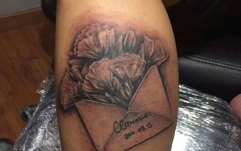 花纹身图片_腿部纹身图案