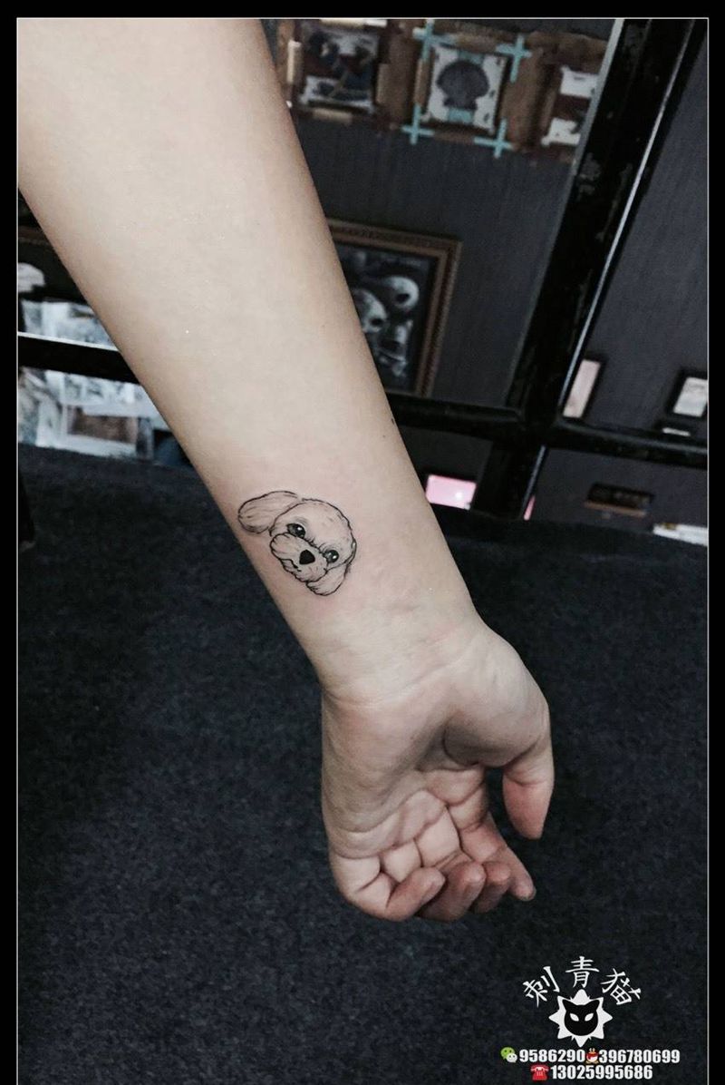 狗狗纹身图片_成品手臂手部清新动物小狗纹身图案