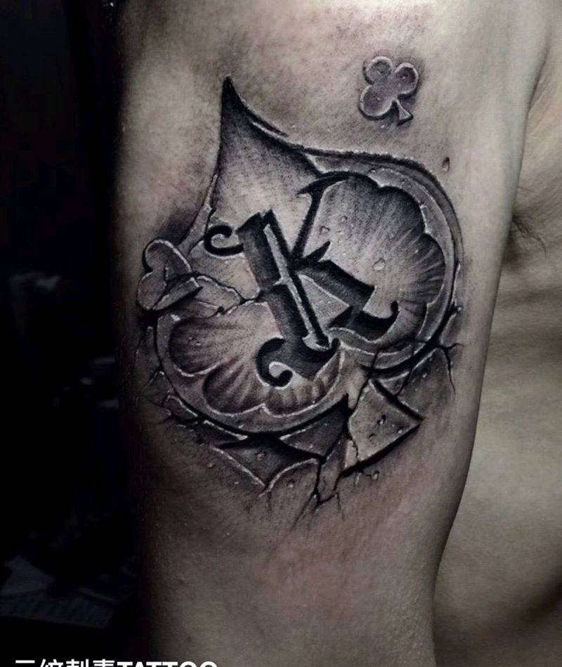 黑桃k纹身图片_手臂纹身图案