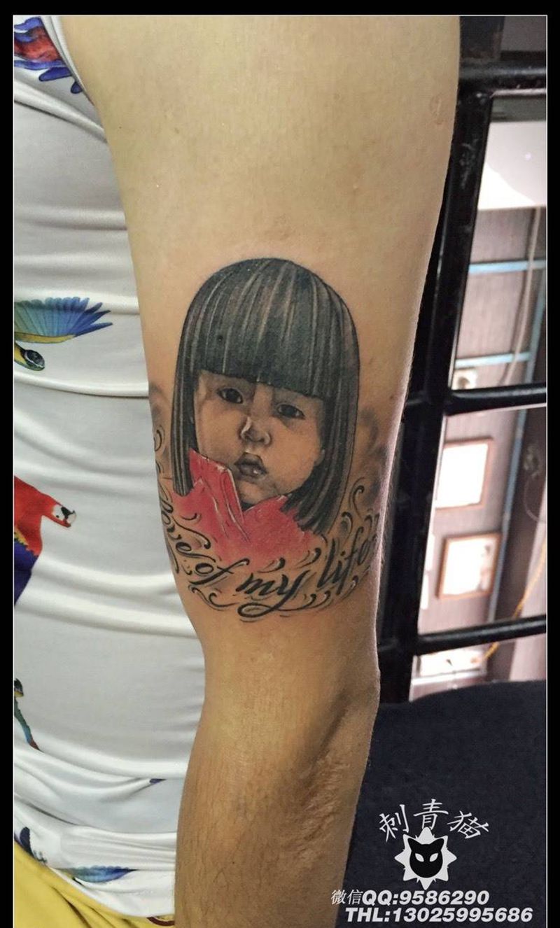 宝宝肖像纹身纹身图片_成品手臂手部传统写实人物肖像纹身图案