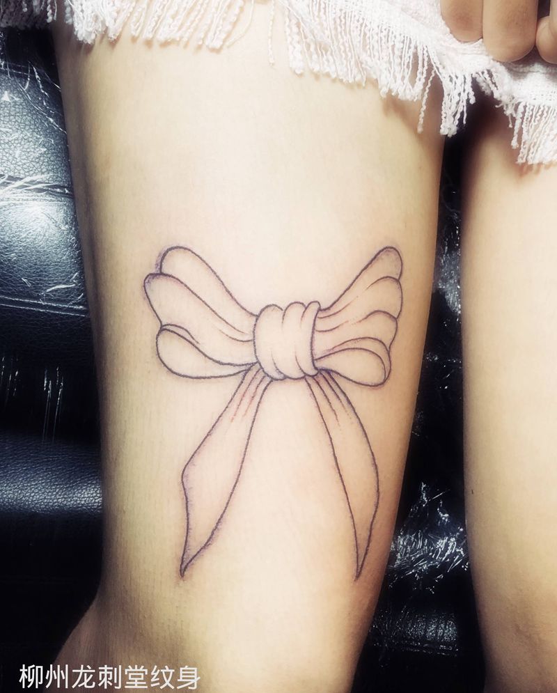 蝴蝶结纹身图片_腿部纹身图案