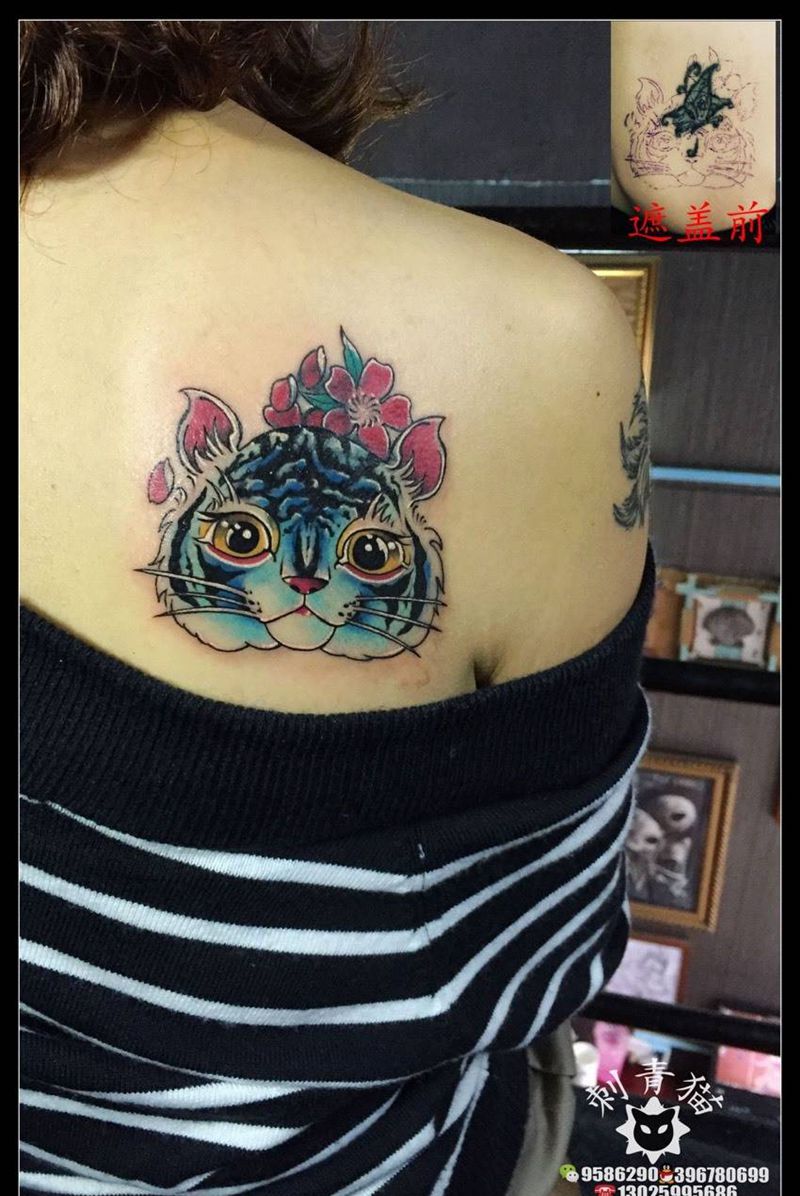 小老虎纹身图片_成品肩部传统清新动物纹身图案