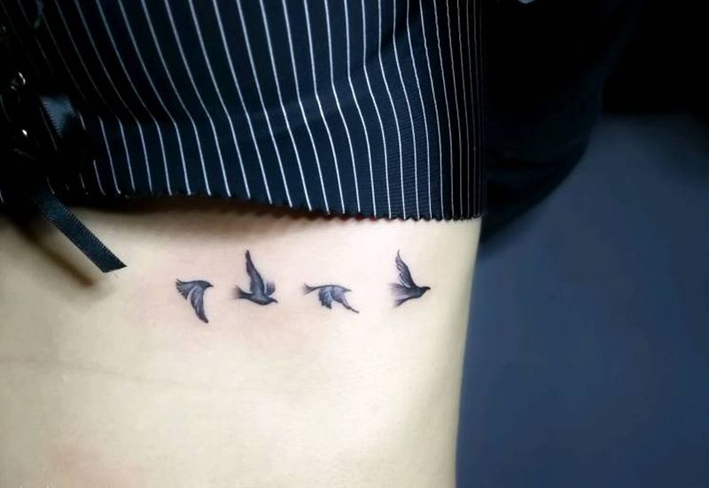 大雁纹身图片_腰部纹身图案
