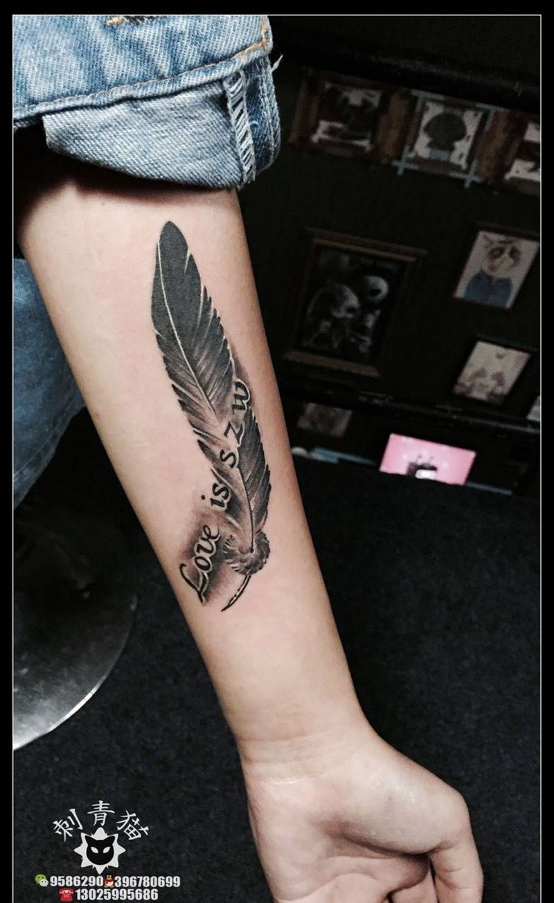 羽毛纹身图片_成品手臂手部清新欧美静物纹身图案