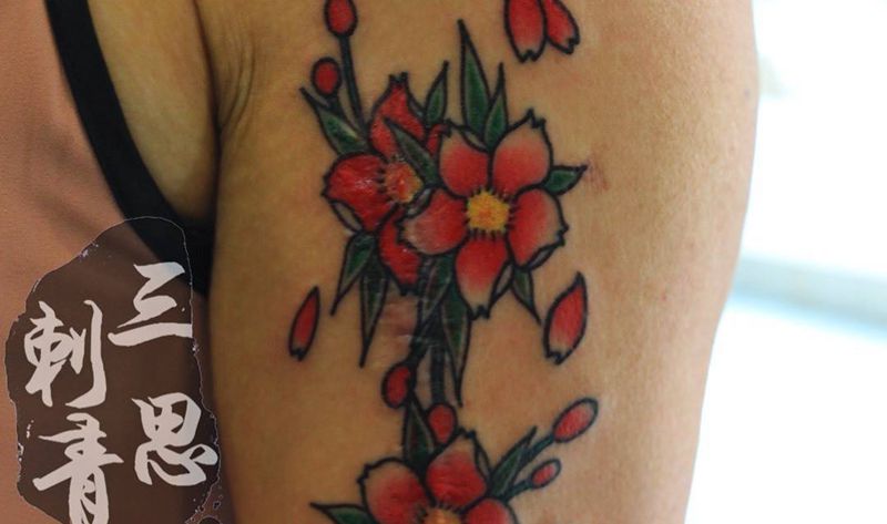 樱花遮盖痕迹纹身图片