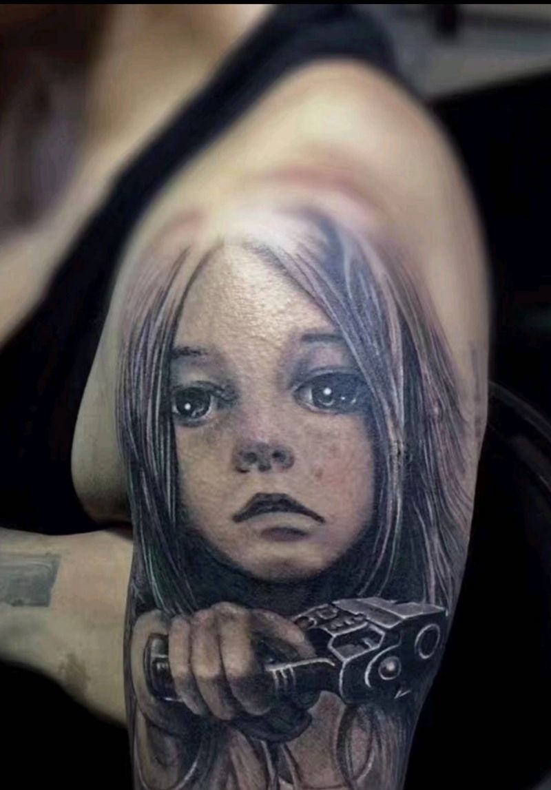 不是很冷的杀手纹身图片_手臂纹身图案