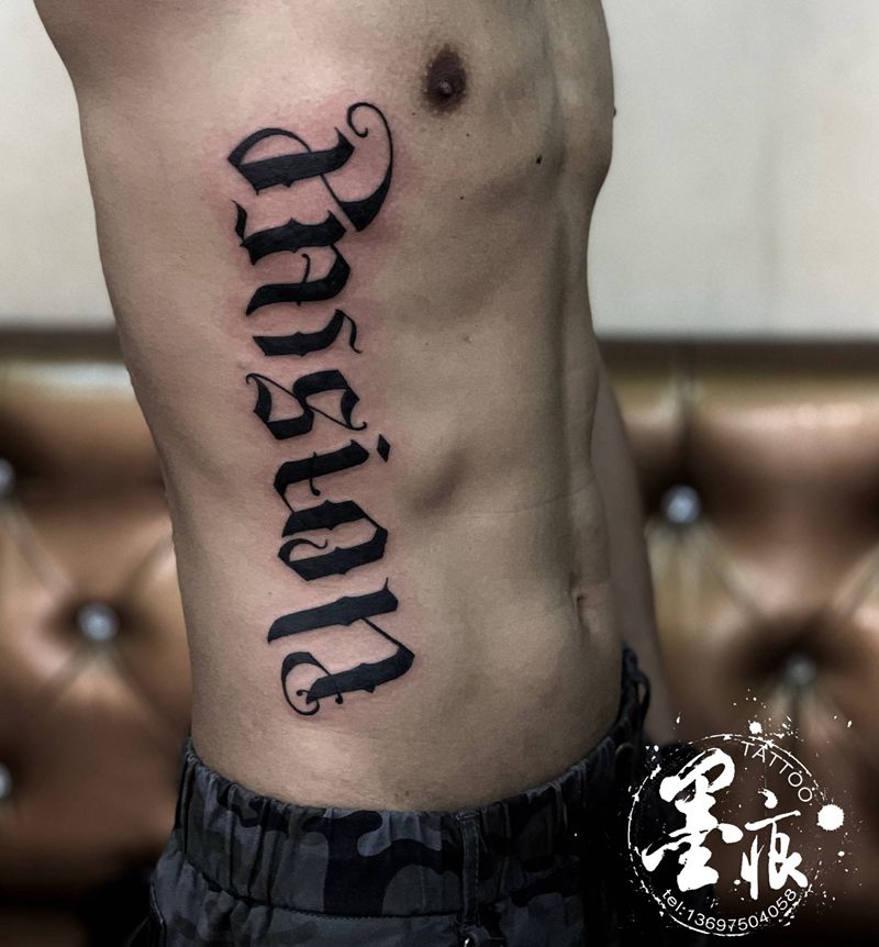 字体纹身图片_腰部腹部纹身图案