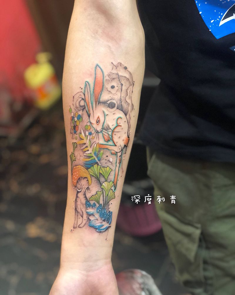 点刺与水彩纹身图片_手臂纹身图案