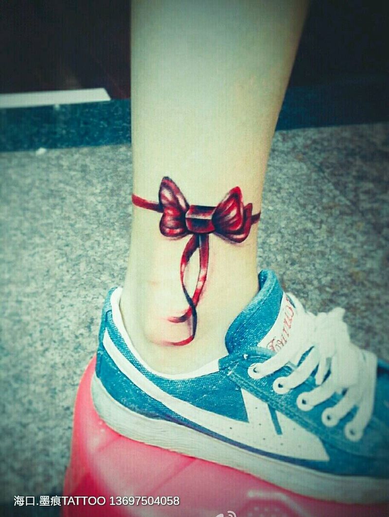 蝴蝶结。纹身图片_腿部脚部静物成品纹身图案