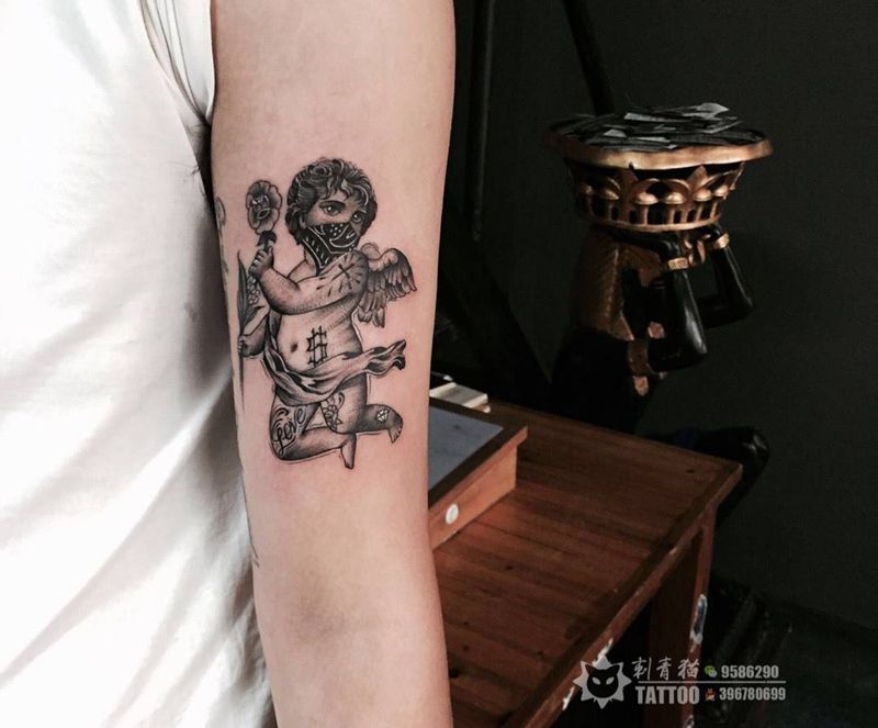 天使纹身图片_手部手臂点刺几何天使纹身图案