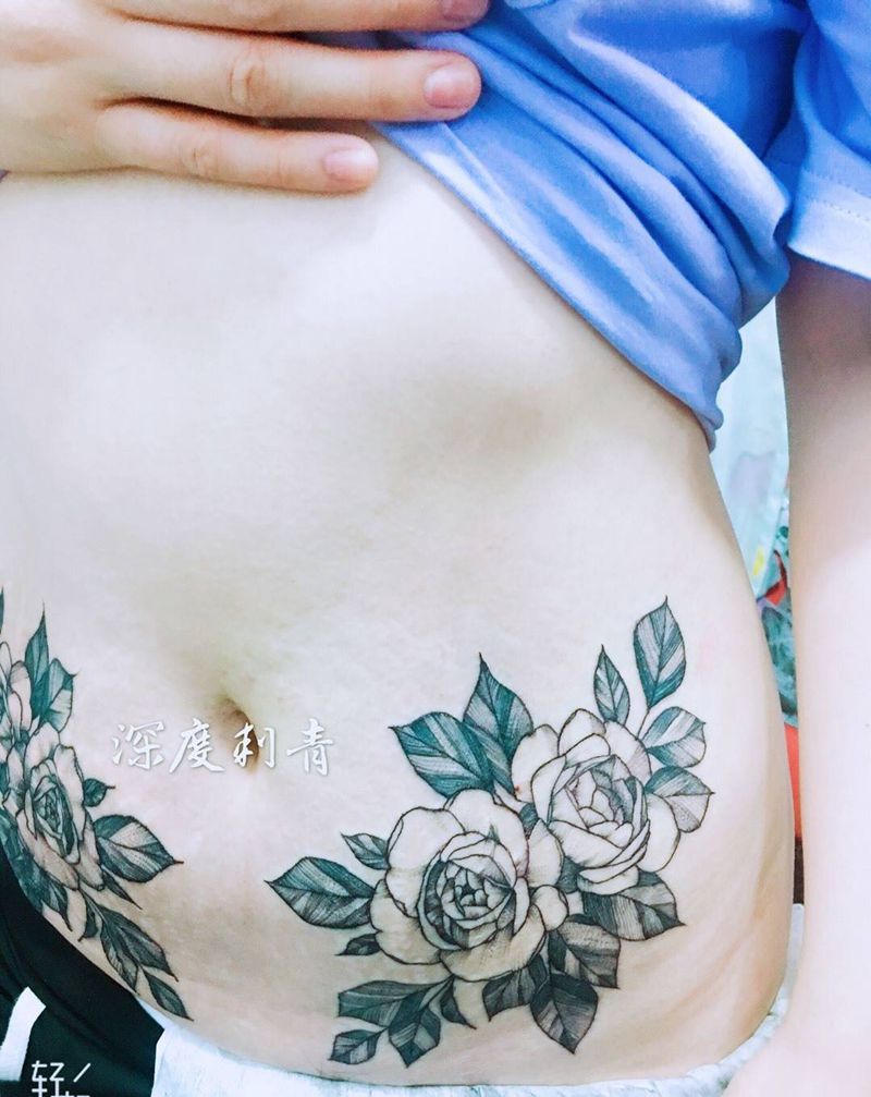 素花遮盖妊辰纹纹身图片