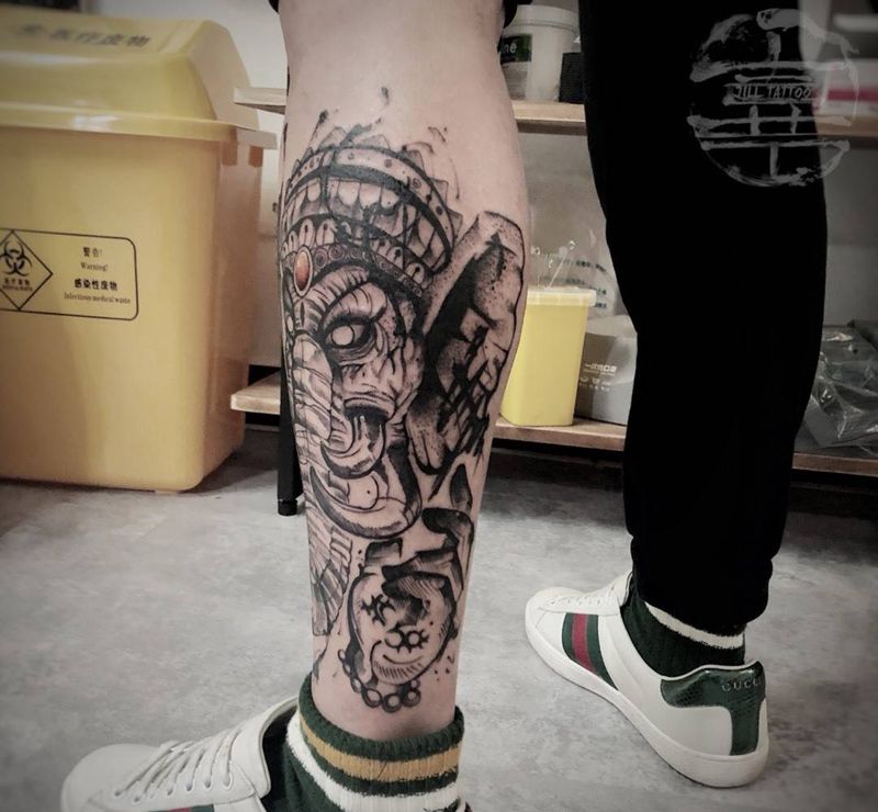 线条象神纹身图片