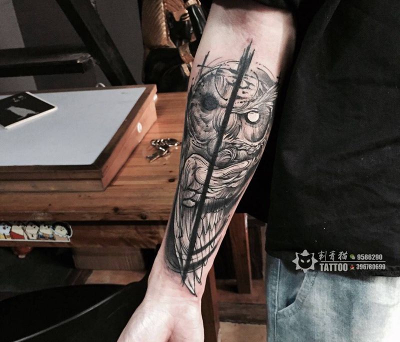 猫头鹰纹身图片_手部手臂几何点刺猫头鹰纹身图案