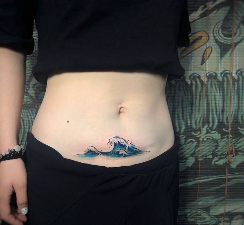 泼墨浪遮盖纹身图片