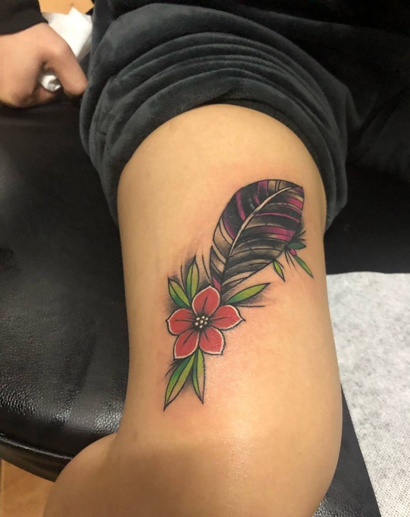 羽毛遮盖纹身图片_腿部传统几何植物动物纹身图案