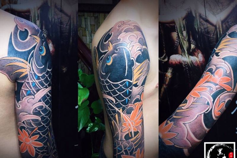 鱼纹身图片_手臂老传统纹身图案