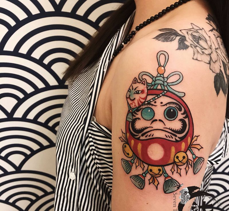 达摩蛋纹身图片_手臂纹身图案