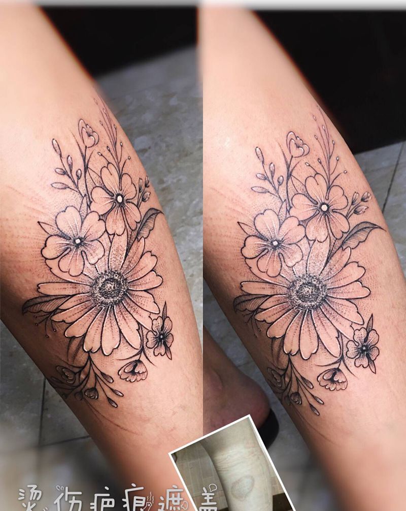 素花纹身图片_腿部点刺素花纹身图案