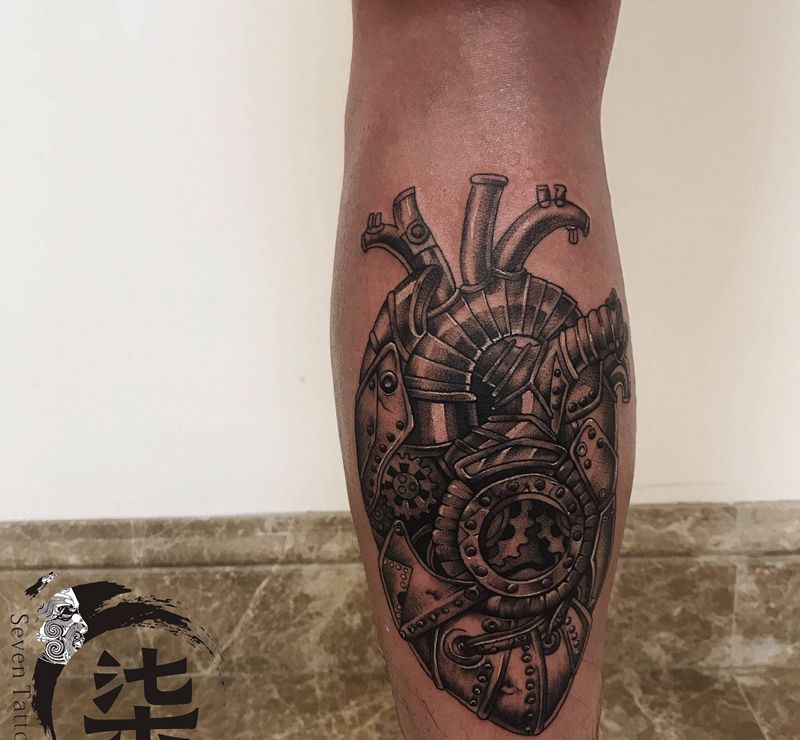 机械心脏⚙️纹身图片_腿部点刺纹身图案
