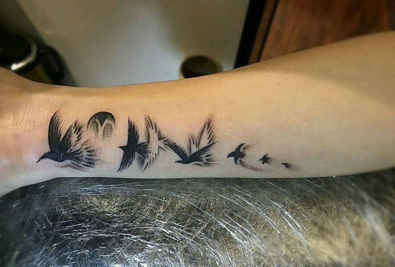 大雁向南飞纹身图片