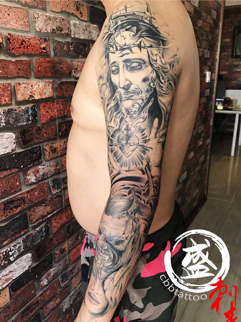 耶稣花臂纹身图片_成品手臂手部欧美写实宗教人物静物纹身图案