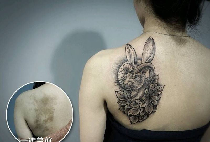 遮盖纹身图片_背部传统动物羊兔子成品纹身图案