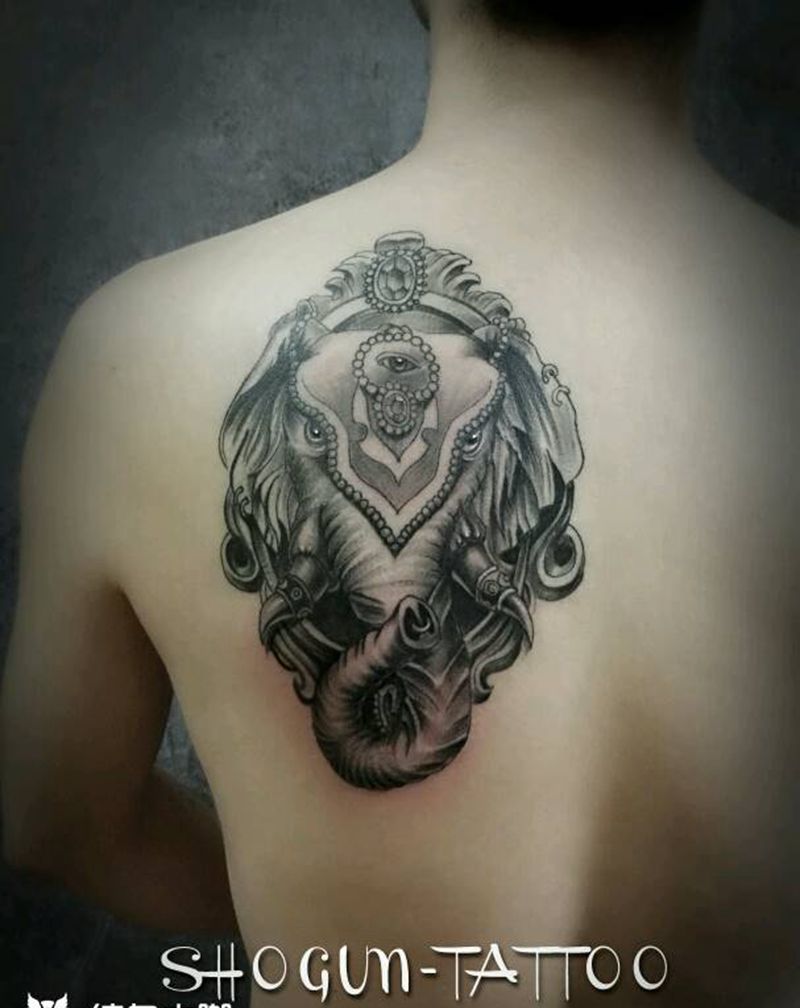 上次没完，这次继续。纹身图片_背部传统写实动物象神成品纹身图案